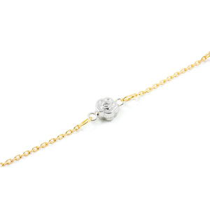 Pulsera niña oro bicolor con margaritas