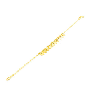 Pulsera oro amarillo con corazones lisos en brillo